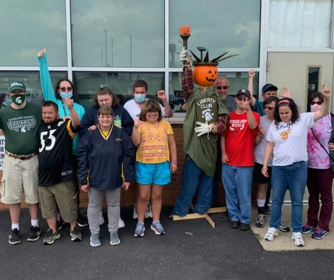 Participants and the Liberty Club Scarecrow