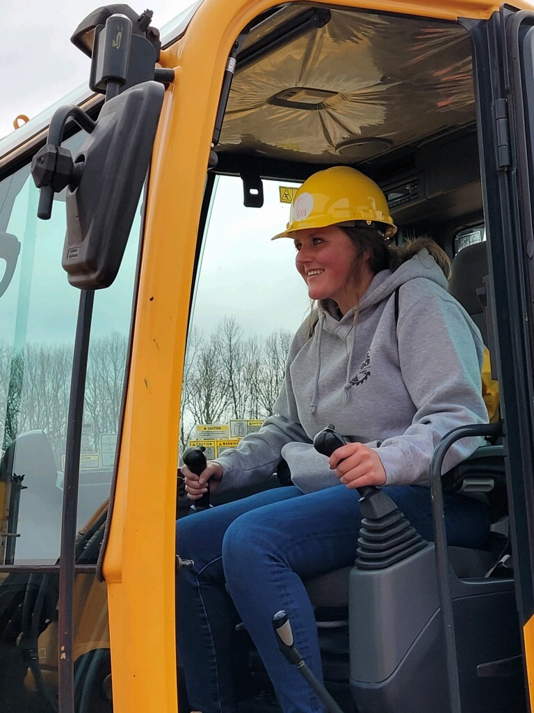Building Trades student driving a construction vehicle