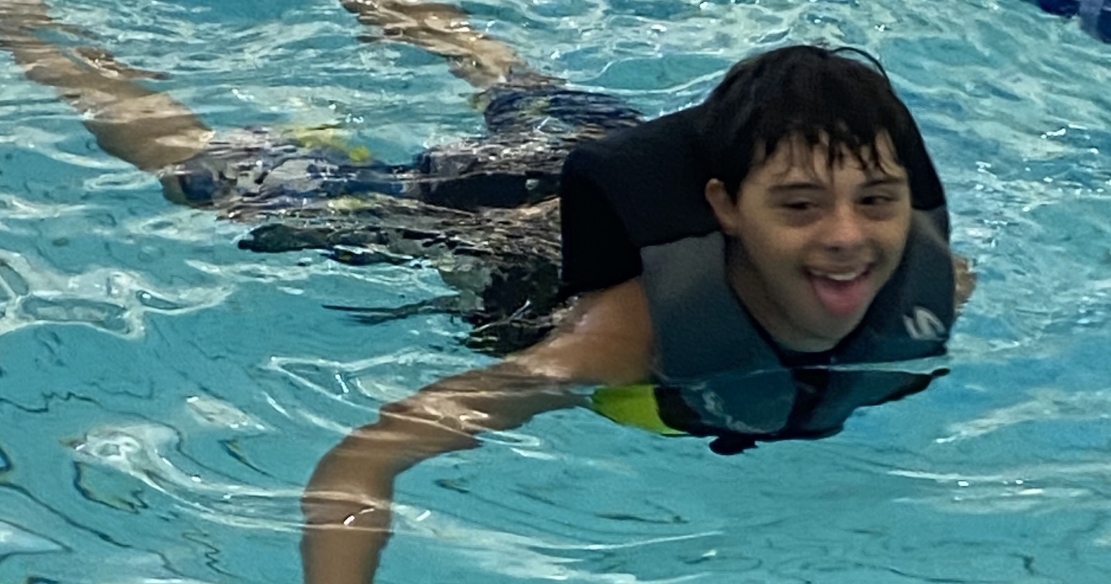 Boy swimming in the pool