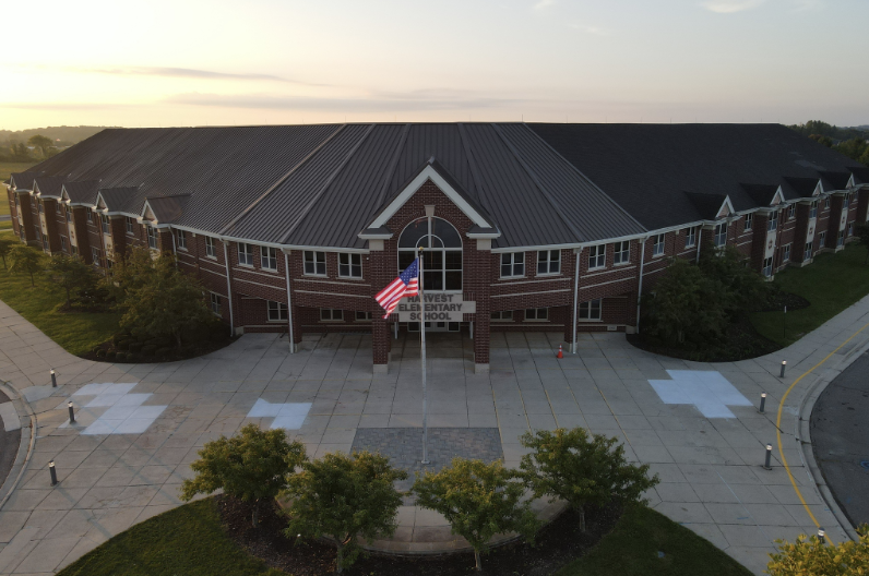 September 2023 - Harvest Elementary Bond Roofing Project - front view with American Flag