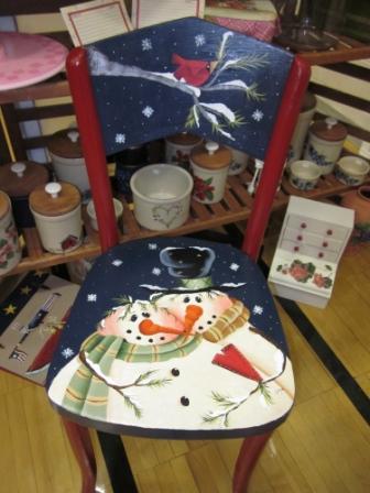 Thirjung's Antique wooden kitchen chair with a snowman