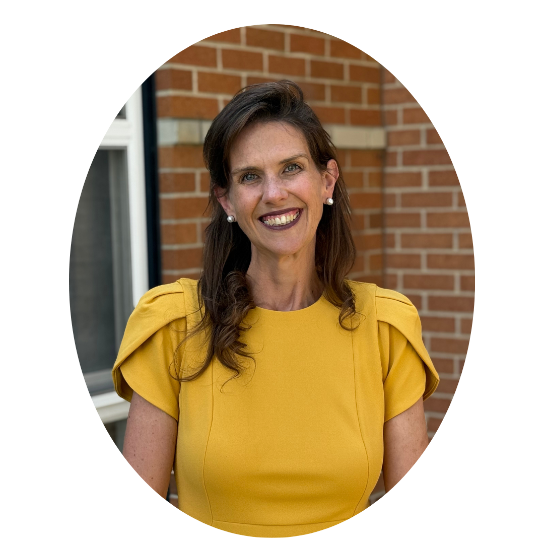 Headshot of Dr. Rachel Kowalski against a brick background